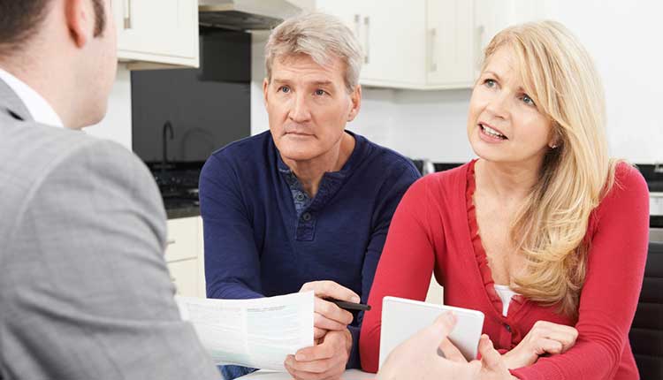 couple speaking to an expert adviser