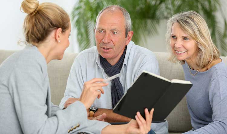 an adviser talking to a couple