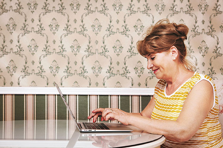 woman searching on laptop