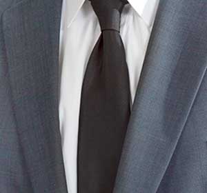 Mens black suit jacket and tie suitable for funeral