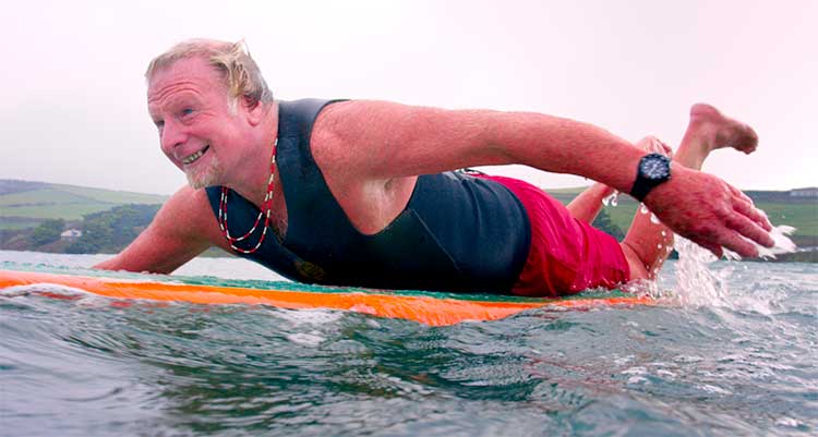 Steve paddling out to surf